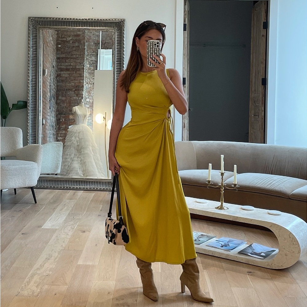 Elegant Yellow Sleeveless Dress with adjustable side cut out